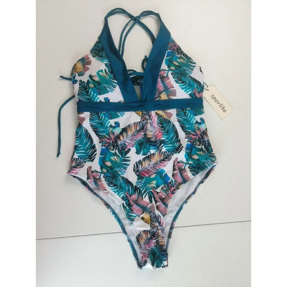 Sporlike‎ one piece swimsuit with V-neck cross back blue color palm designs sz M